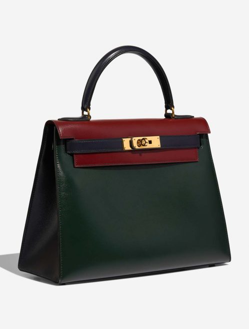 Hermès Kelly 28 VertFonce-RougeH-Indigo Side Front  | Sell your designer bag on Saclab.com