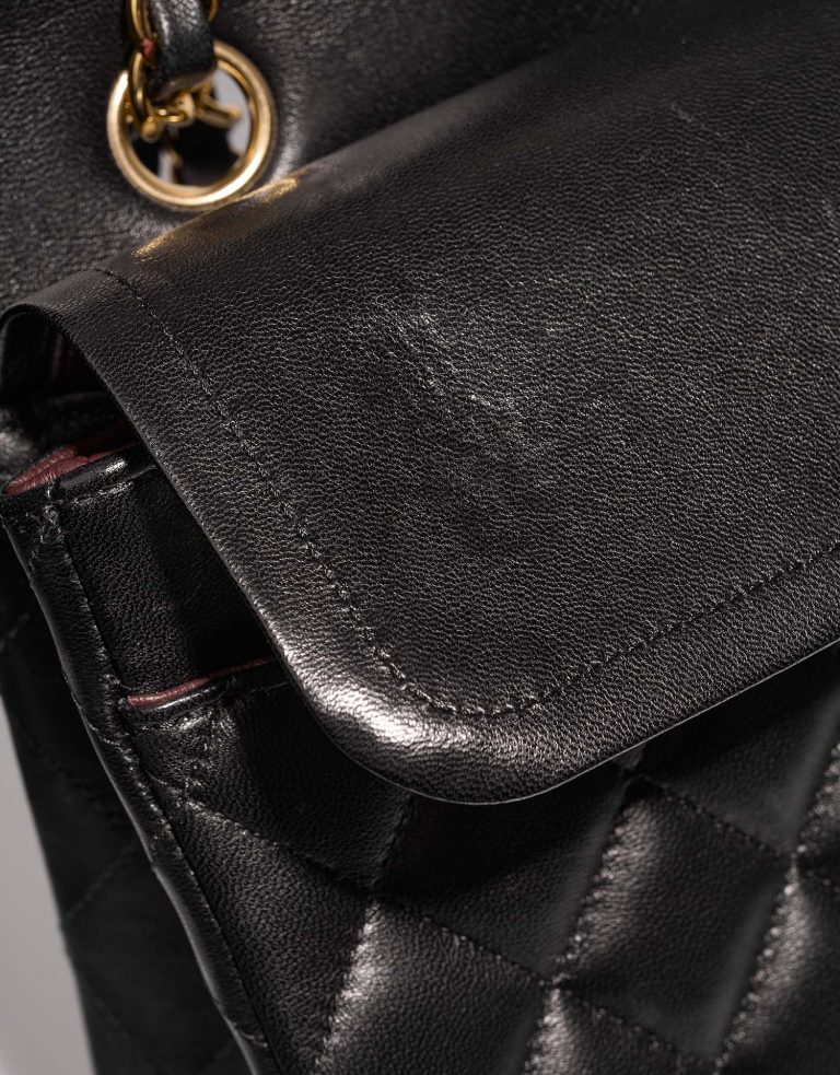 Chanel Timeless Medium Black signs of wear 1 | Sell your designer bag on Saclab.com