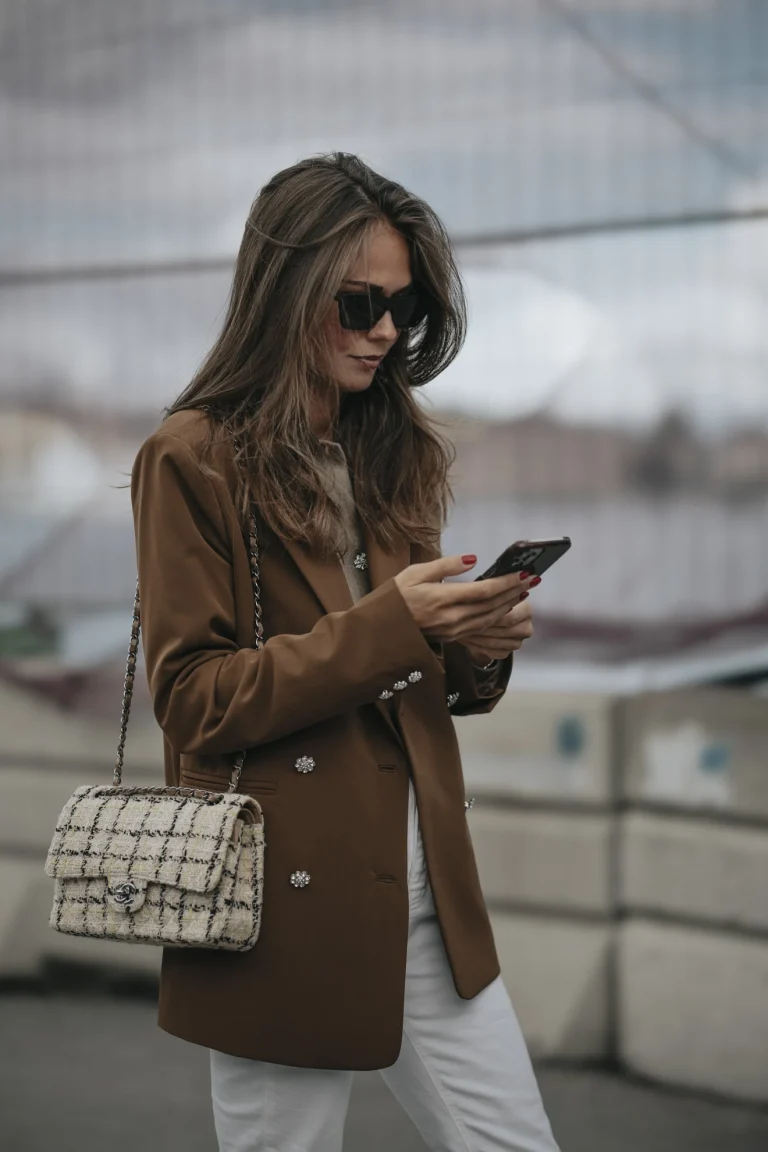 Chanel Flap bag in White tweed. Stockholm S23. Image: Launchmetrics Spotlight