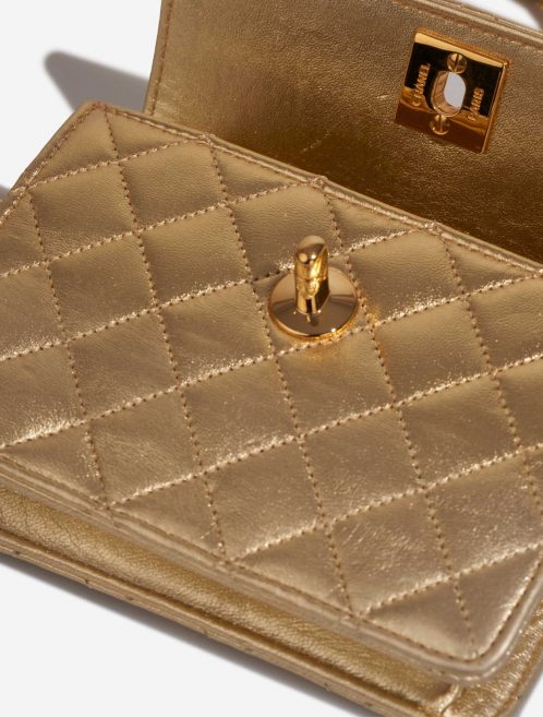Chanel Timeless ExtraMini Gold Inside | Sell your designer bag on Saclab.com