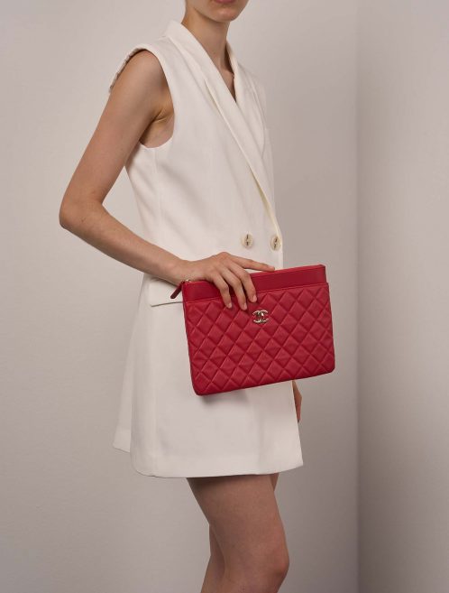 Chanel Timeless Clutch Lamb Red on Model | Sell your designer bag