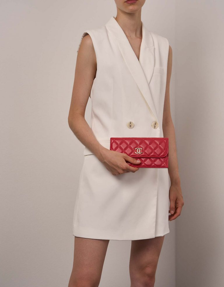 Chanel Timeless Clutch Lamb Red on Model | Sell your designer bag