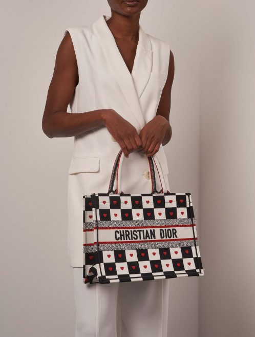 Dior BookTote Small Black-White-Red on Model | Sell your designer bag on Saclab.com