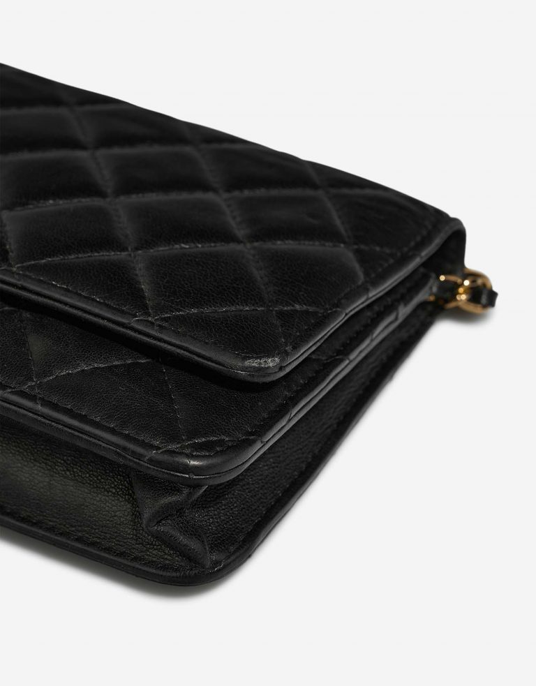 Chanel Timeless WalletOnChain Black signs of wear| Sell your designer bag on Saclab.com