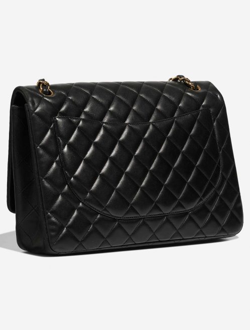 Chanel Timeless Maxi Black Side Back | Sell your designer bag on Saclab.com