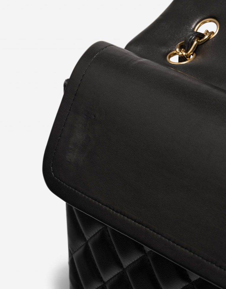 Chanel Timeless Maxi Black signs of wear 1 | Sell your designer bag on Saclab.com