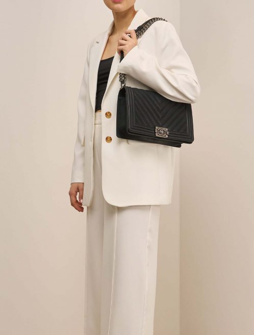 Chanel Boy NewMedium Black on Model | Sell your designer bag on Saclab.com