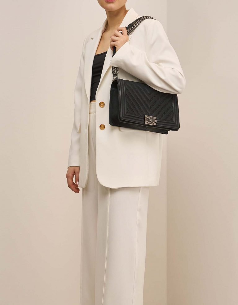 Chanel Boy NewMedium Black on Model | Sell your designer bag on Saclab.com