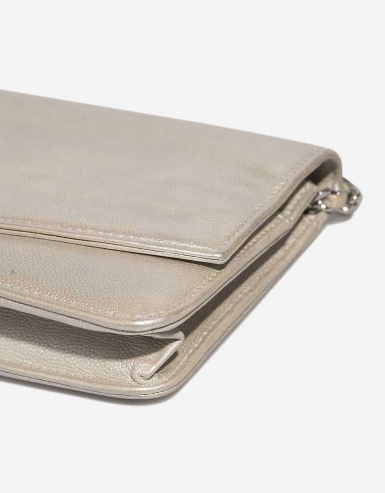 Chanel Timeless Wallet On Chain Caviar Shiny Champagne Signs of wear | Sell your designer bag