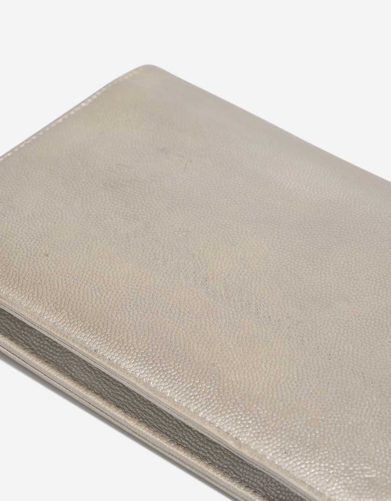 Chanel Timeless Wallet On Chain Caviar Shiny Champagne Signs of wear | Sell your designer bag