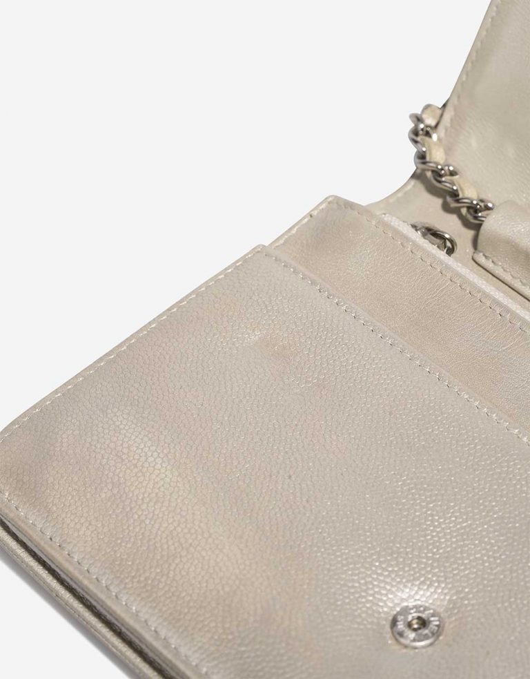 Chanel Timeless Wallet On Chain Caviar Shiny Champagne Signs of wear | Sell your designer bag