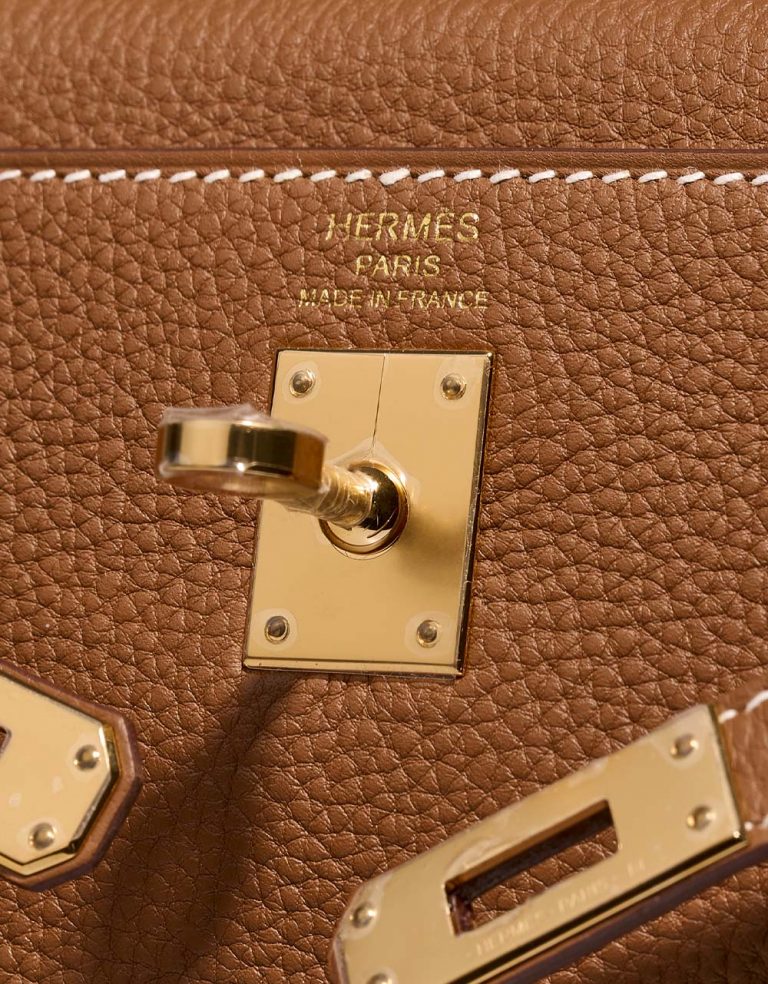 Hermès Kelly 25 Gold Logo  | Sell your designer bag on Saclab.com