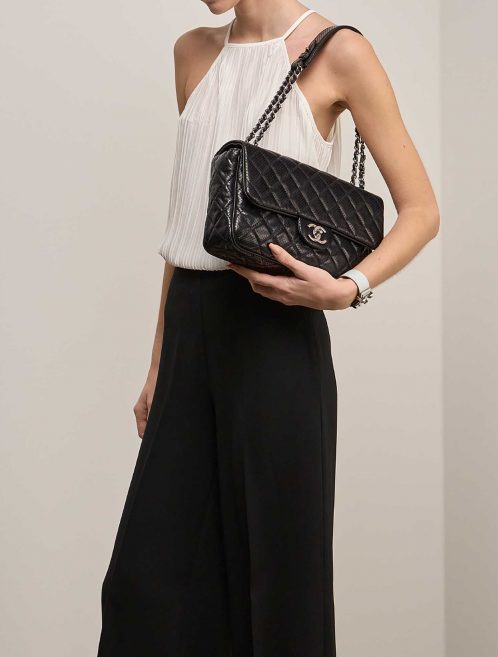 Chanel Timeless Jumbo Black on Model | Sell your designer bag on Saclab.com