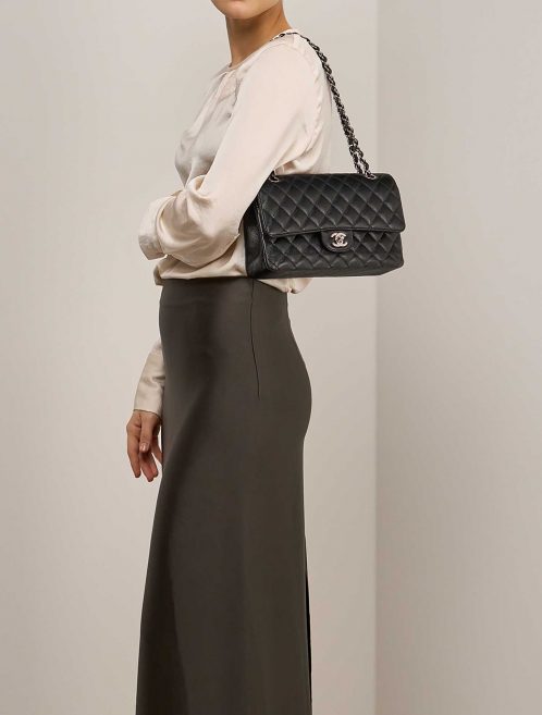 Chanel Timeless Medium Black on Model | Sell your designer bag on Saclab.com