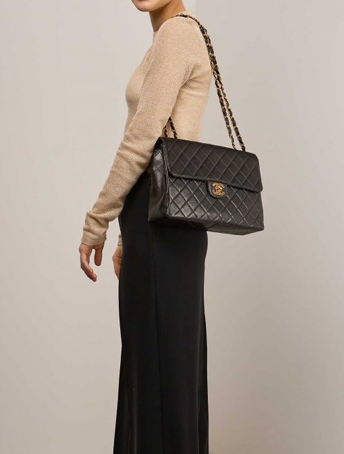 Chanel Timeless Jumbo Black on Model | Sell your designer bag on Saclab.com