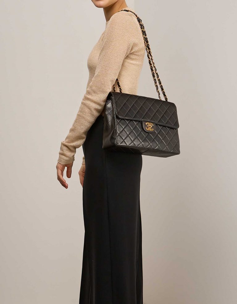 Chanel Timeless Jumbo Black on Model | Sell your designer bag on Saclab.com
