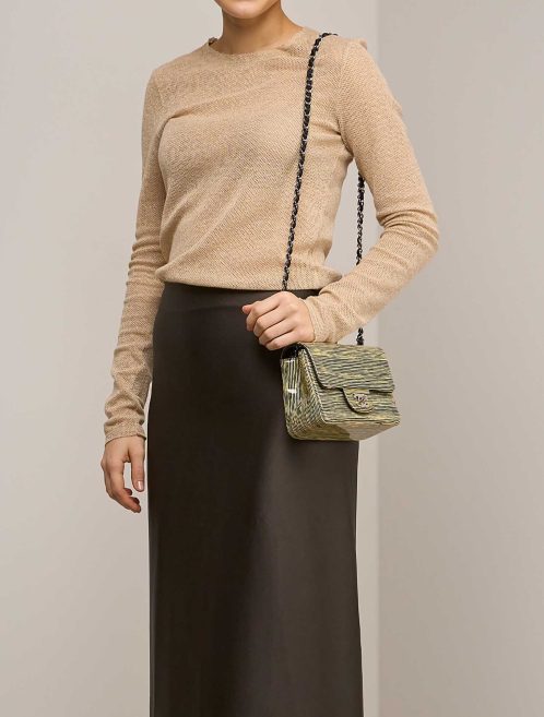 Chanel Timeless Mini Square Patent Pastel Yellow / Black on Model | Sell your designer bag