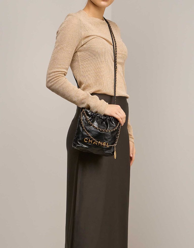 Chanel 22 Mini Calf Black on Model | Sell your designer bag