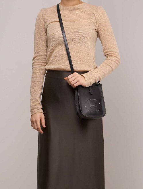 Hermès Evelyne 16 Box Black on Model | Sell your designer bag
