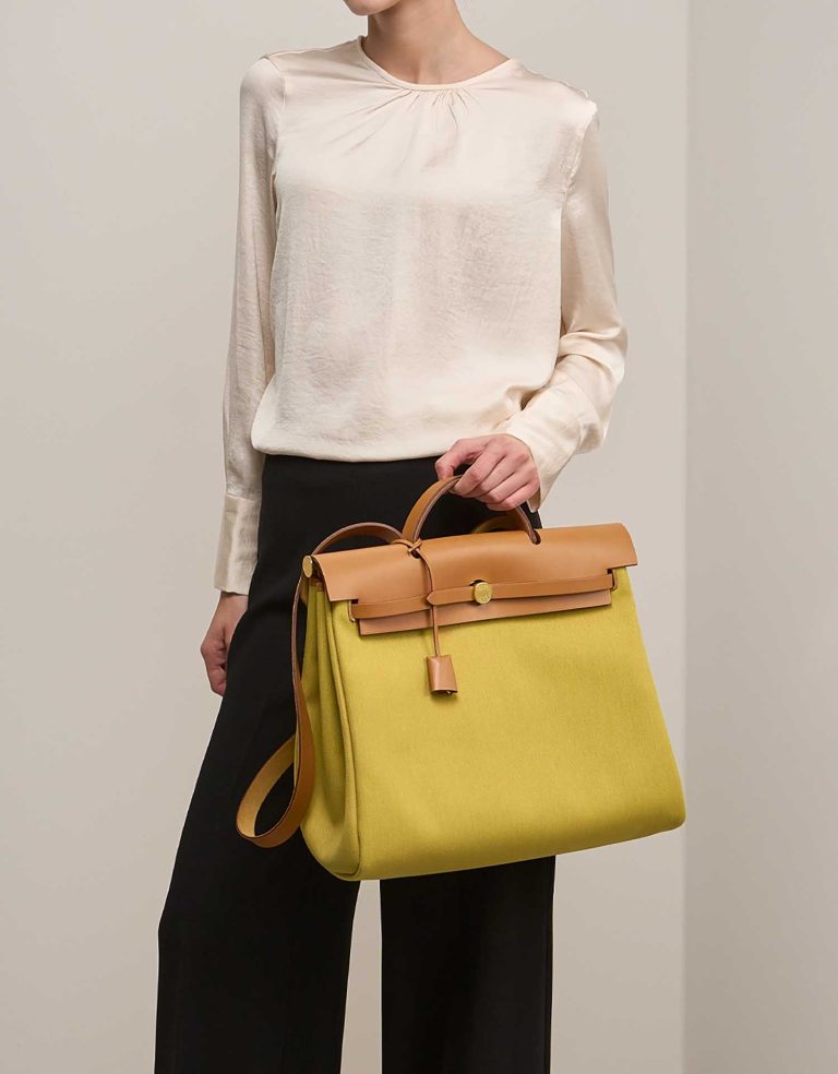 Hermès Herbag 39 Toile / Vache Hunter Ginger / Naturel on Model | Sell your designer bag