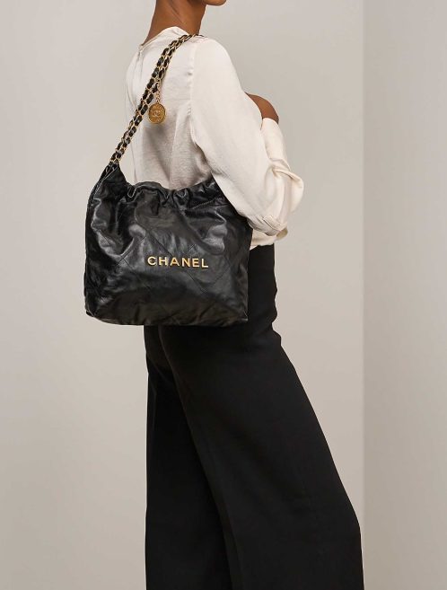 Chanel 22 Small Lamb Black on Model | Sell your designer bag