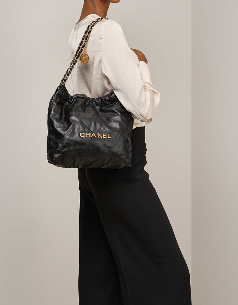 Chanel 22 Small Lamb Black on Model | Sell your designer bag