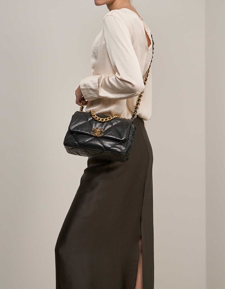 Chanel 19 Flap Bag Goat Black  on Model | Sell your designer bag