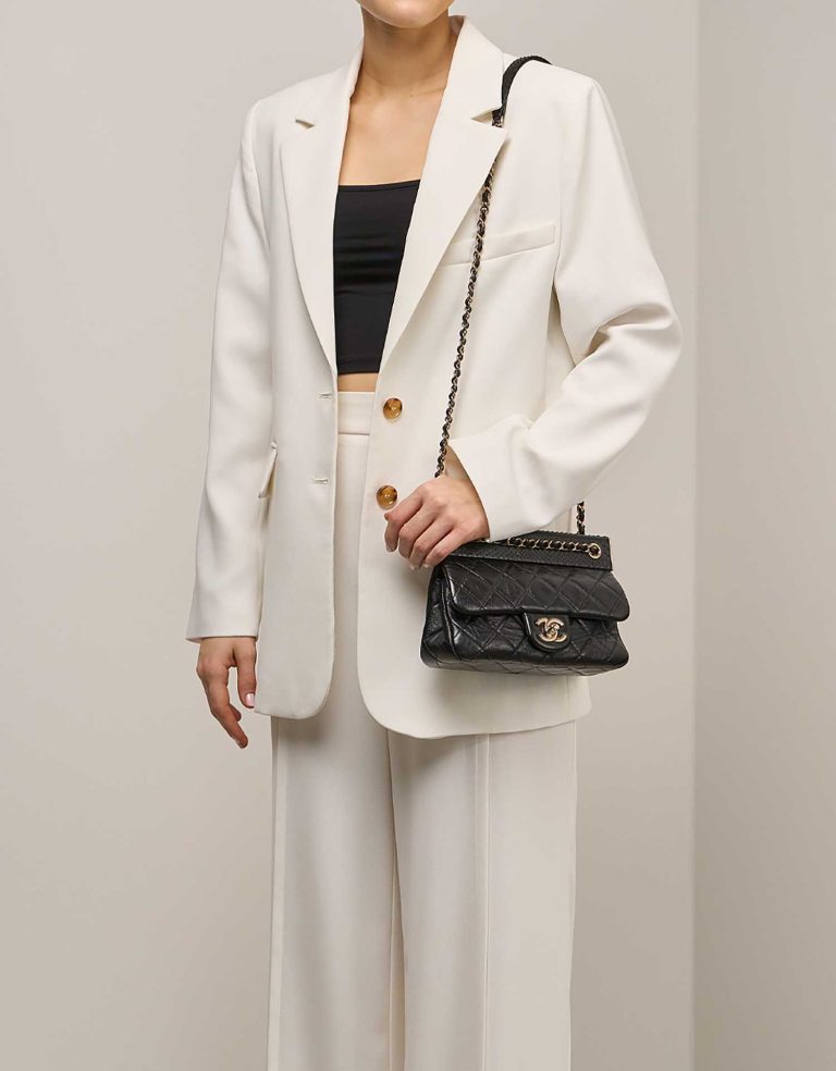 Chanel Timeless Small Aged Calf / Python Black on Model | Sell your designer bag