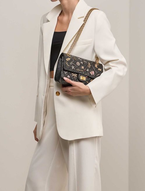 Chanel 2.55 Reissue 225 Aged Calf Black on Model | Sell your designer bag