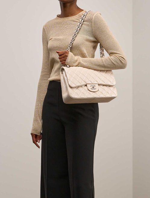Chanel Timeless Maxi Caviar Pearl White on Model | Sell your designer bag
