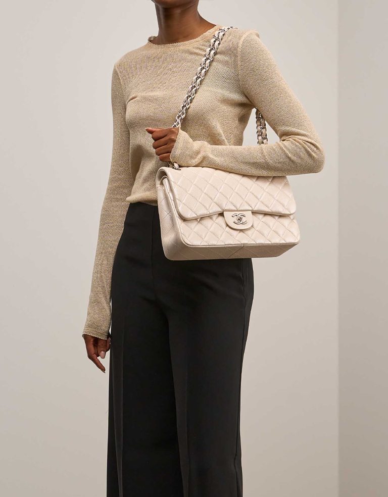 Chanel Timeless Maxi Caviar Pearl White on Model | Sell your designer bag
