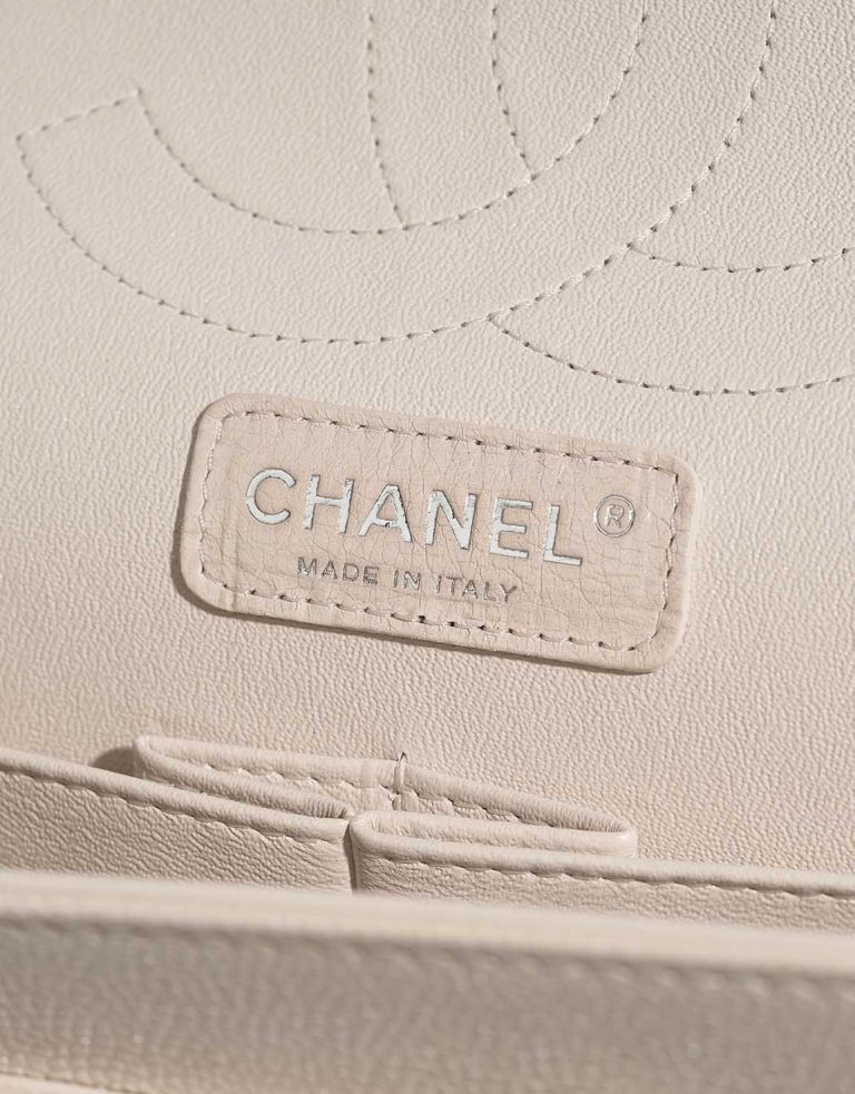 Chanel Timeless Maxi Caviar Pearl White Logo | Sell your designer bag