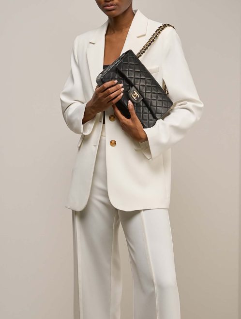 Chanel Timeless Medium Lamb Black on Model | Sell your designer bag