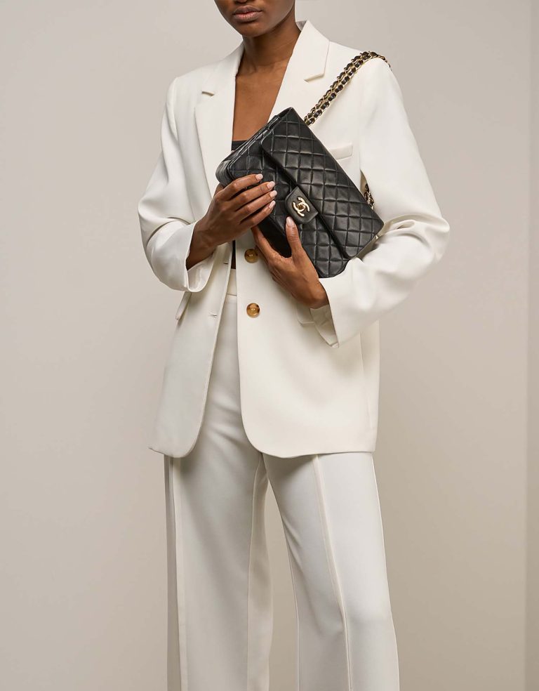 Chanel Timeless Medium Lamb Black on Model | Sell your designer bag