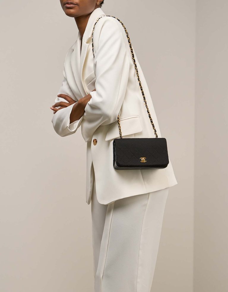 Chanel Timeless Mini Rectangular Cotton / Lamb Black on Model | Sell your designer bag