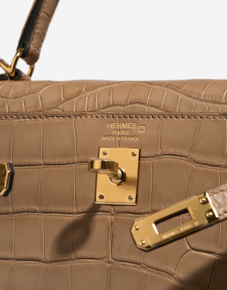 Hermès Kelly 25 Matte Alligator Chai Logo | Sell your designer bag
