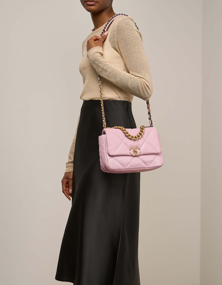 Chanel 19 Flap Bag Lamb Light Pink on Model | Sell your designer bag