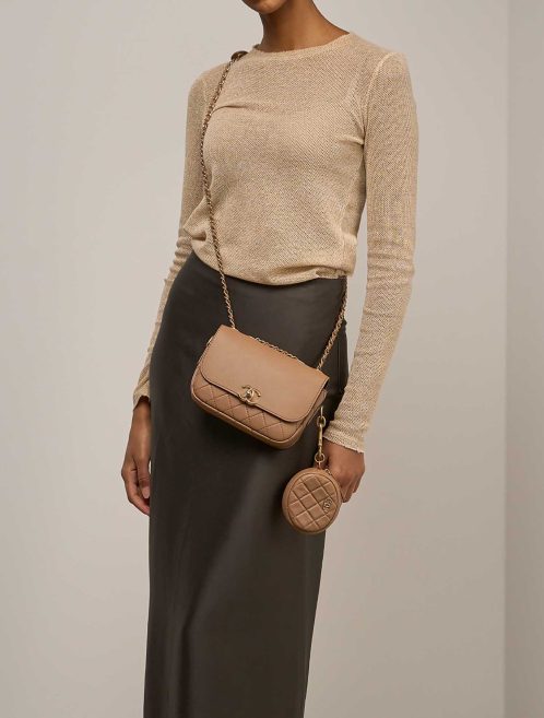 Chanel Flap Bag Small Lamb Brown on Model | Sell your designer bag