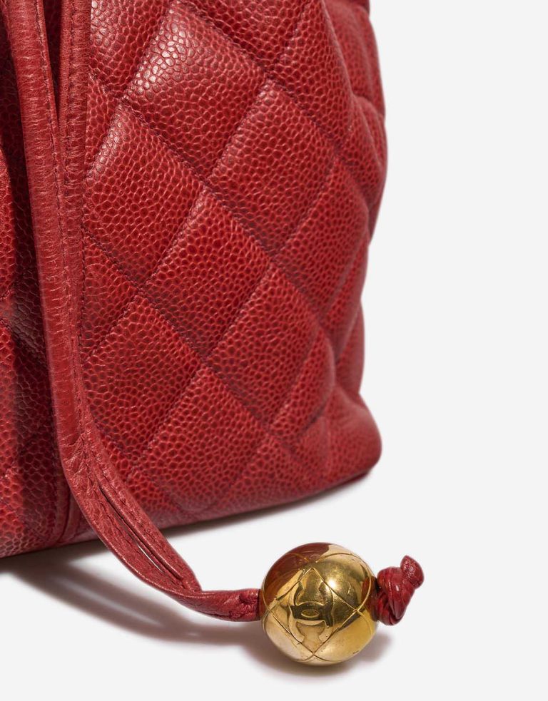 Chanel Drawstring Caviar Red Closing System | Sell your designer bag