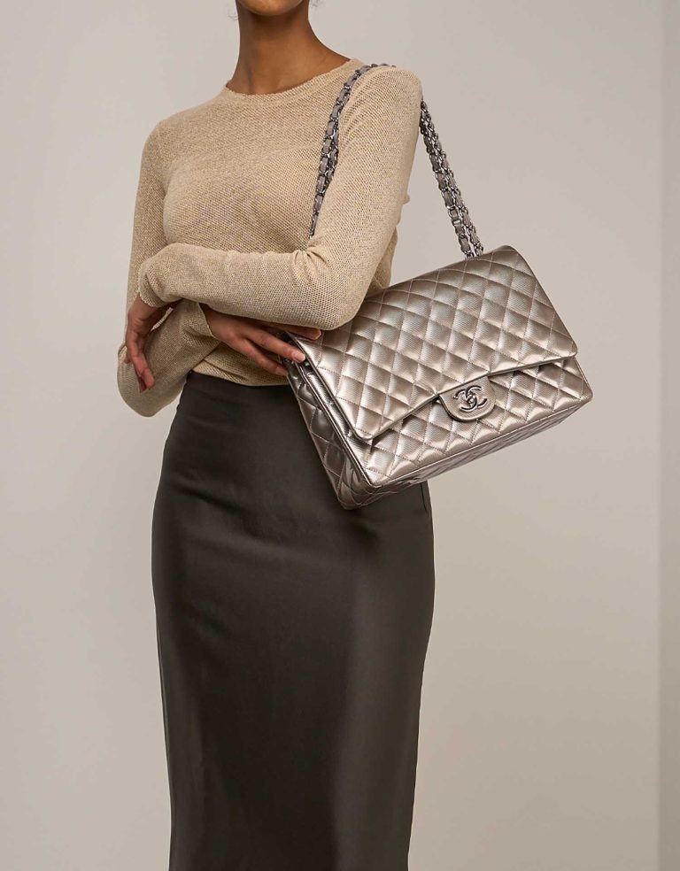 Chanel Timeless Maxi PVC / Lamb Silver / Grey on Model | Sell your designer bag