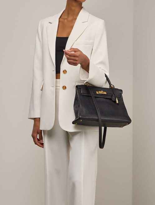 Hermès Kelly 32 Ardennes Bleu Marine on Model | Sell your designer bag
