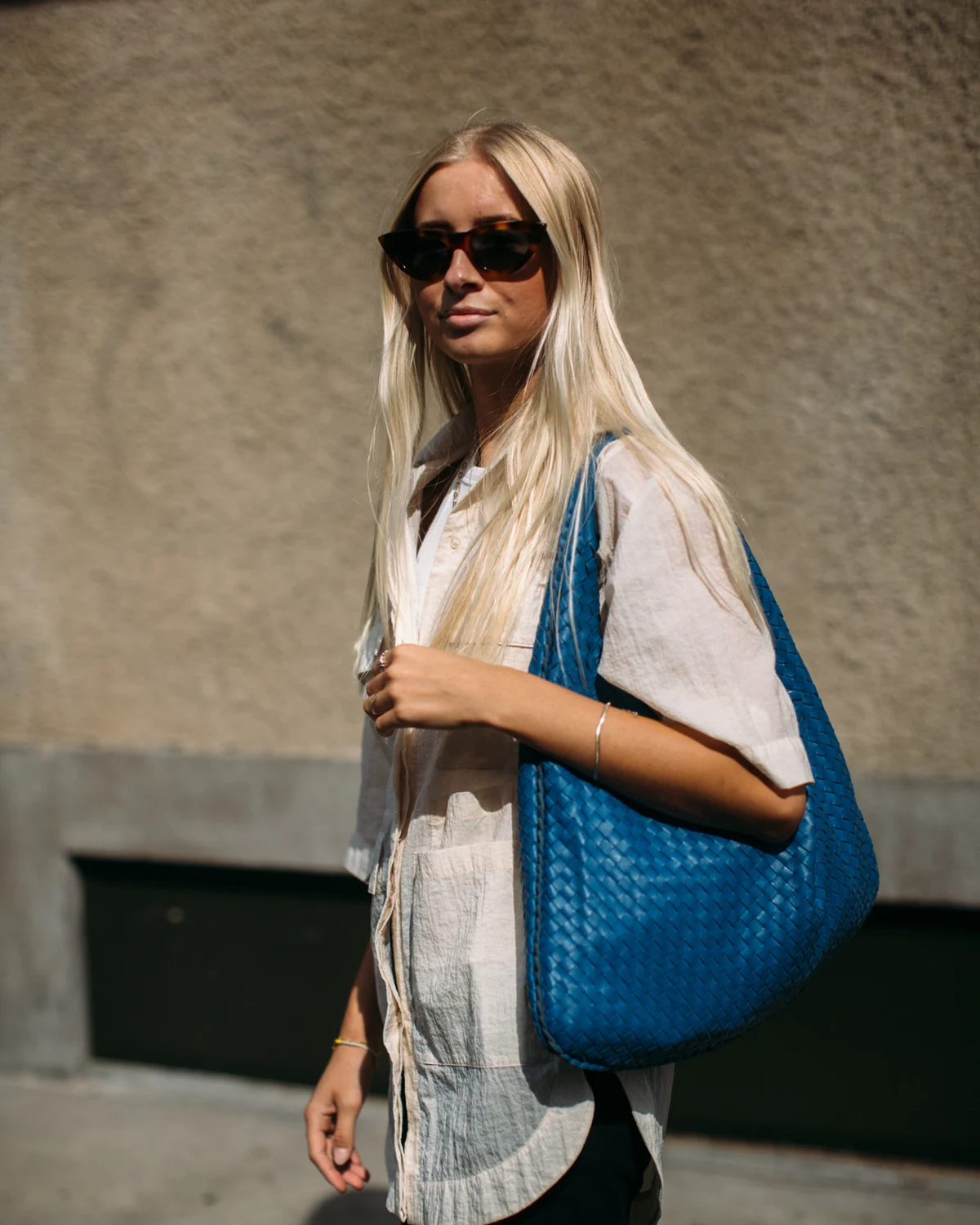 Vintage Hobo Bag in blue, Copenhagen str S22. Image: Launchmetrics Spotlight 