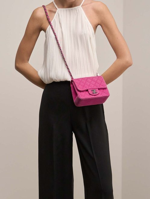 Chanel Timeless Mini Square Caviar Pink on Model | Sell your designer bag