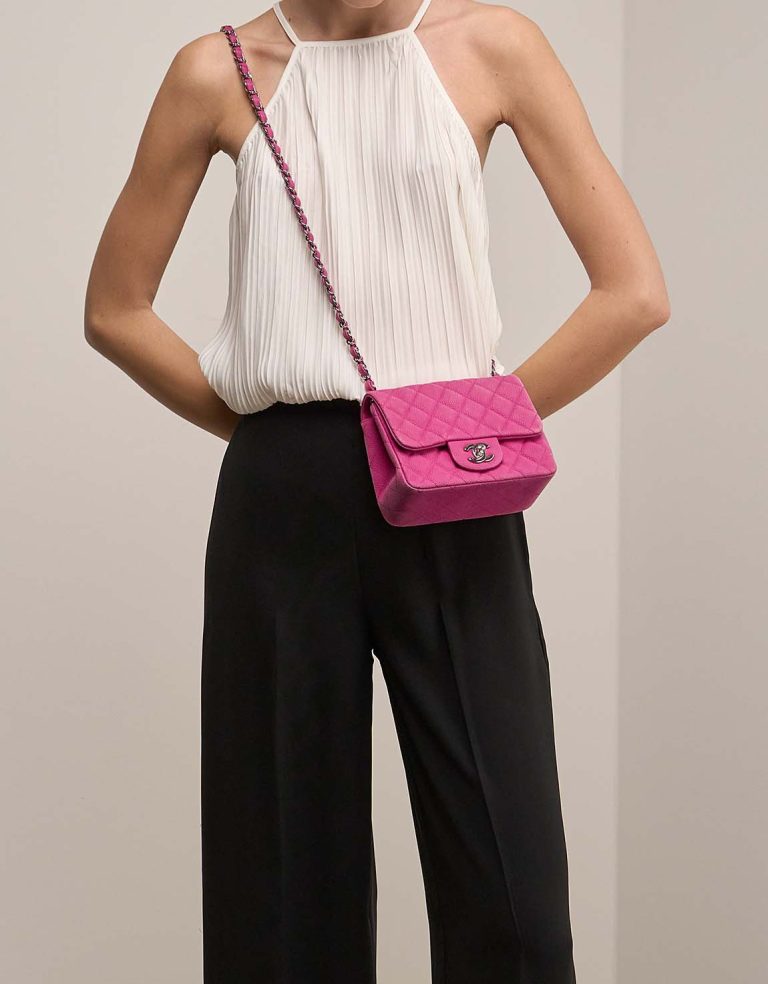 Chanel Timeless Mini Square Caviar Pink on Model | Sell your designer bag