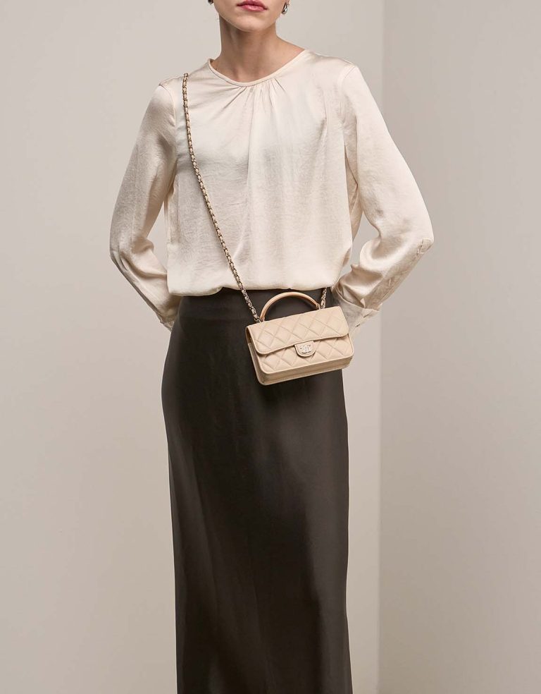 Chanel Timeless Wallet On Chain Lamb Beige on Model | Sell your designer bag