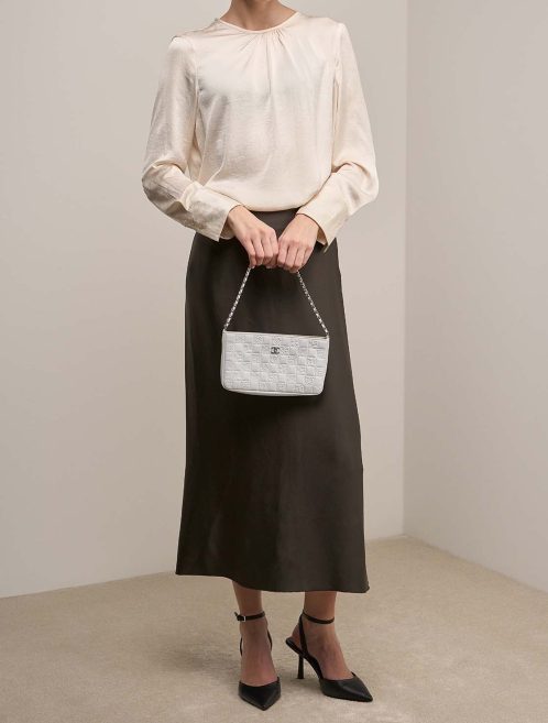 Chanel Clutch With Chain Small Lamb White on Model | Sell your designer bag