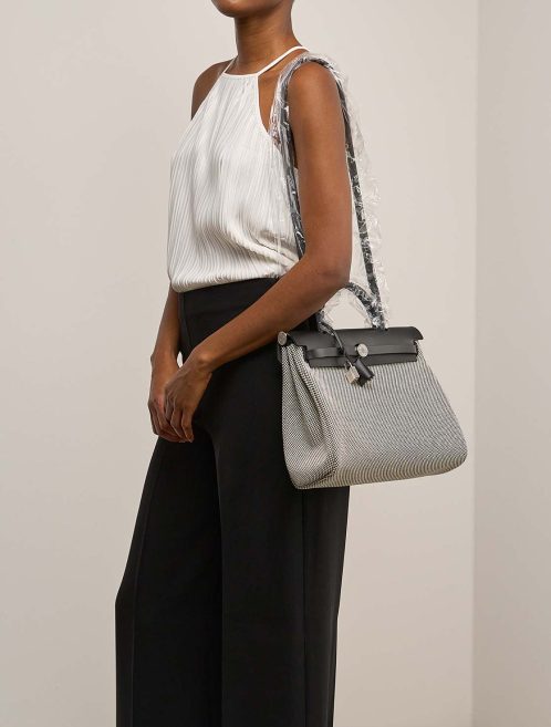 Hermès Herbag 31 Toile Criss / Vache Hunter Black / Écru on Model | Sell your designer bag