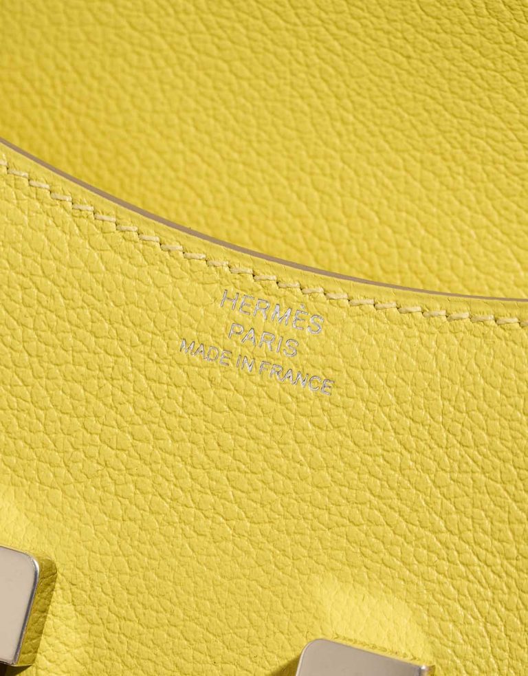 Hermès Constance Slim Wallet Evercolor Lime Logo | Sell your designer bag
