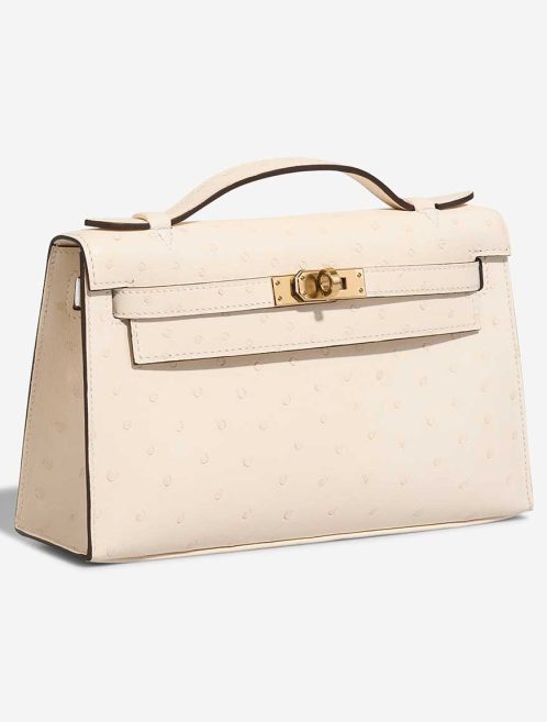 Hermès Kelly Pochette Mini Ostrich Nata | Sell your designer bag