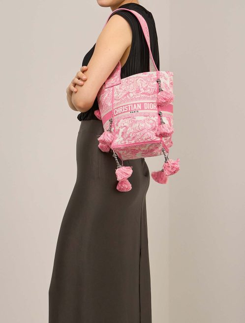 Dior D Bubble Bucket Canvas Neon Pink / White on Model | Sell your designer bag